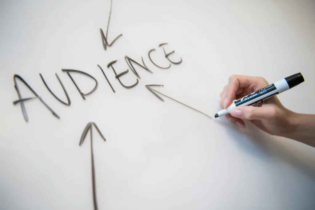 marker board with "Audience" written on it and arrows pointing towards the word