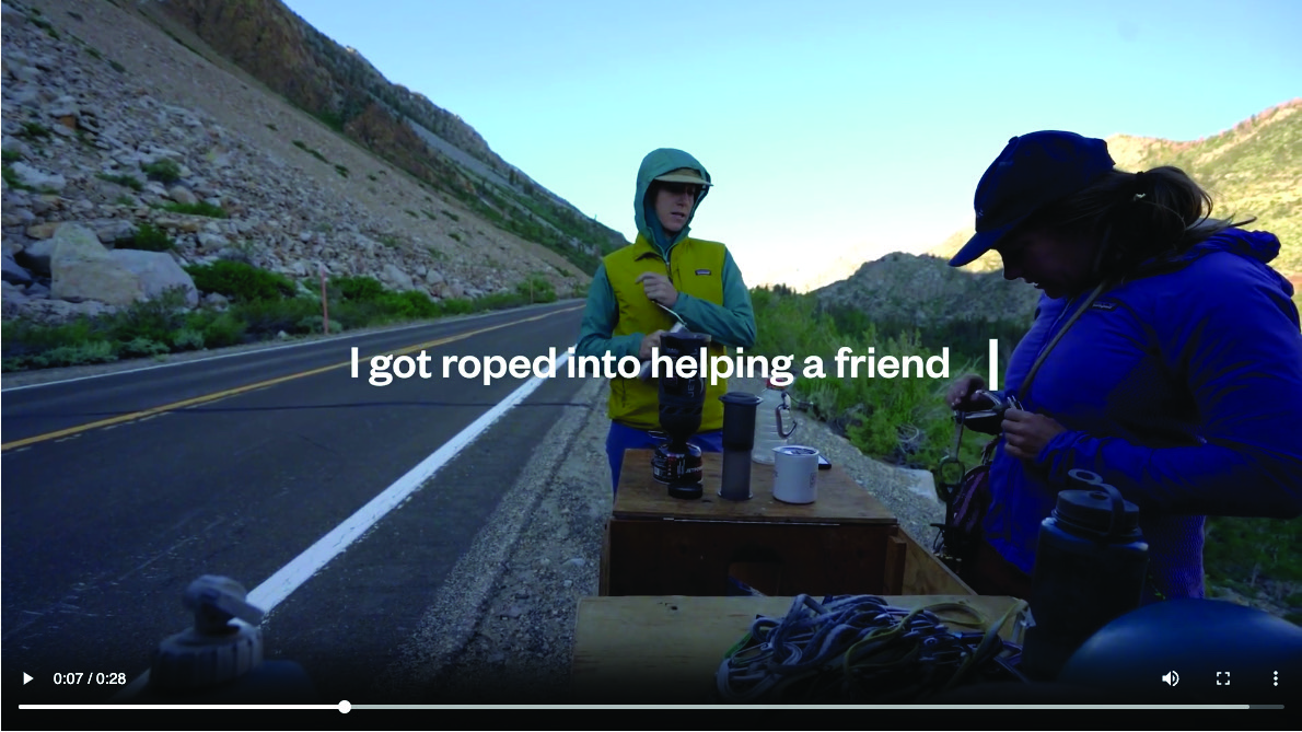 Still from the Escape Responsibility video ad. Text on top of people next to a road with drinks reads "I got roped into helping a friend" 